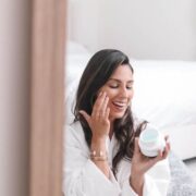 Woman Applying Skincare